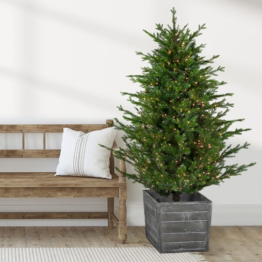 6Ft Pre-Lit Deluxe Russian Pine Artificial Christmas Tree in Planter, Warm White LED Lights By Northlight in Green | 6 ft | Michaels®